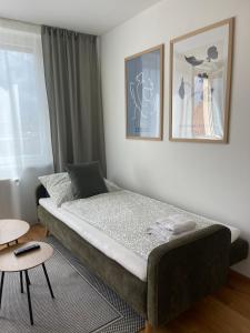Rúm í herbergi á Wohnung in Graz SOVA 3