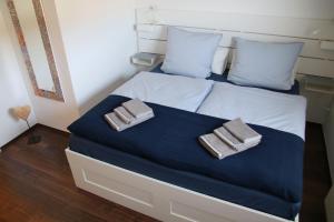 Voodi või voodid majutusasutuse Wunderschönes Appartement In Scheid Mit Grill toas