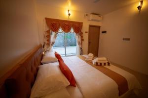 Uma cama ou camas num quarto em Velana Vibes at Mathiveri