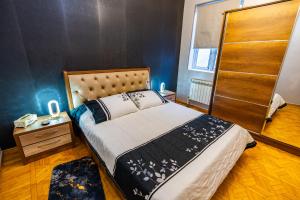 Postel nebo postele na pokoji v ubytování Hotel Elemtega Kutaisi + 24 fotografií