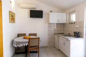 Kuchyňa alebo kuchynka v ubytovaní Apartments Julijana