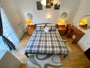 Posteľ alebo postele v izbe v ubytovaní Apartments Julijana