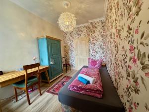 Postel nebo postele na pokoji v ubytování Privatzimmer in 4 Zimmer EG Wohnung in Altchemnitz