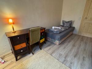 Posezení v ubytování Privatzimmer in 4 Zimmer EG Wohnung in Altchemnitz