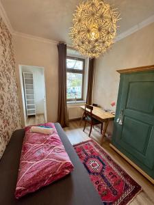 Postel nebo postele na pokoji v ubytování Privatzimmer in 4 Zimmer EG Wohnung in Altchemnitz
