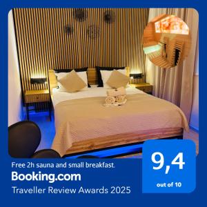 a hotel room with a bed with two teddy bears on it at Sauna studio near centre/airport in Prague