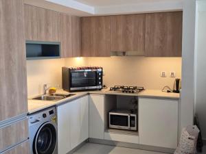 Kuchyň nebo kuchyňský kout v ubytování Marassi marina west + 2 fotografie