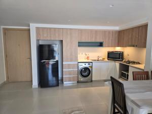 Kuchyň nebo kuchyňský kout v ubytování Marassi marina west