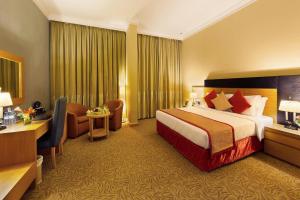 Postel nebo postele na pokoji v ubytování Hotel Luxe Stay Near Delhi Airport