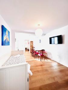 A television and/or entertainment centre at El Beaterio Apartments