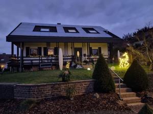 Κήπος έξω από το Ferienhaus Eifelsteig Krimihauptstadt Hillesheim