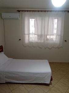 Una cama o camas en una habitación de Ramaj's home