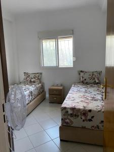 Postel nebo postele na pokoji v ubytování Appartement