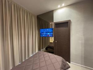 Posteľ alebo postele v izbe v ubytovaní Tropicana Room