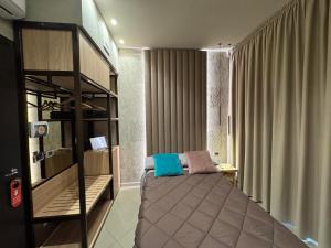 Posteľ alebo postele v izbe v ubytovaní Tropicana Room