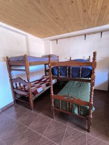 Una cama o camas en una habitación de Hostel VERBENITA