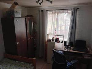 Dapur atau dapur kecil di Comoda Habitación en Rancagua