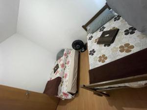 Postel nebo postele na pokoji v ubytování Plaza Shopping Guarus