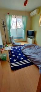 Clear Up Guest House的电视和/或娱乐中心