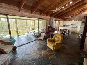 a large living room with a table and chairs at BasinWaterStays Waterfront Jetty - Brm1 in Basin View