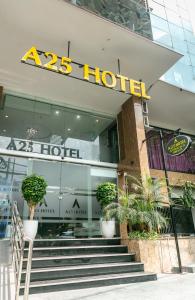 a hotel with stairs in front of a building at A25 Hotel - 21 Le Duc Tho in Hanoi
