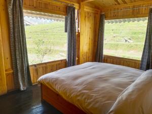 Giường trong phòng chung tại ZOZO Sapa Homestay & Trekking