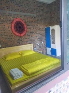 Postel nebo postele na pokoji v ubytování Mẩy Gấu Homestay