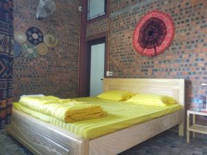 Postel nebo postele na pokoji v ubytování Mẩy Gấu Homestay