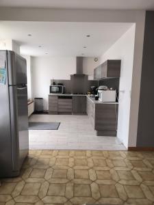 Kuchyň nebo kuchyňský kout v ubytování la Villa Nova