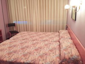 Postel nebo postele na pokoji v ubytování Hotel Faranda Alisas Santander, Ascend Hotel Collection