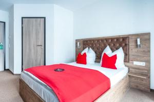 Postel nebo postele na pokoji v ubytování B&S Hotel
