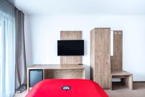 TV a/nebo společenská místnost v ubytování B&S Hotel