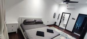 Ένα ή περισσότερα κρεβάτια σε δωμάτιο στο Akasea Sojourn +13 φωτογραφίες