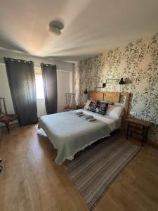 Postel nebo postele na pokoji v ubytování Lindo y acogedor Apartamento Grao Playa Gandia piso 5to sin ascensor