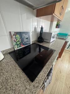 Kuchyň nebo kuchyňský kout v ubytování Lindo y acogedor Apartamento Grao Playa Gandia piso 5to sin ascensor