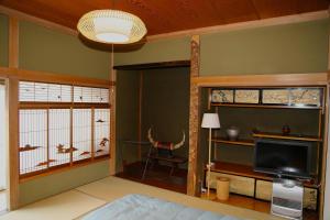 TV a/nebo společenská místnost v ubytování 民泊-和-Guesthouse-wa-