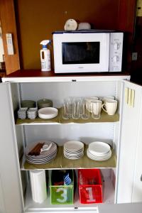 Kuchyň nebo kuchyňský kout v ubytování 民泊-和-Guesthouse-wa-