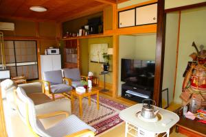 Kuchyň nebo kuchyňský kout v ubytování 民泊-和-Guesthouse-wa-