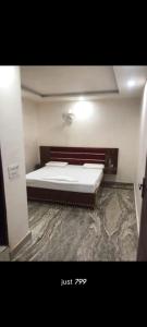 Katil atau katil-katil dalam bilik di HOTEL ORCHID INn