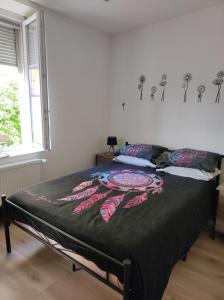 Postel nebo postele na pokoji v ubytování Chez Dori Chambre privée