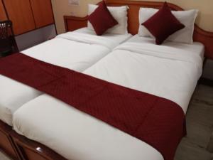 Letto o letti in una camera di Mysuru-hotel