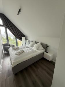 Ein Bett oder Betten in einem Zimmer der Unterkunft Ostsee - Reetdachhaus Nr 42 "Waterkant" im Strand Resort
