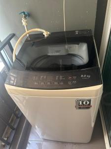 a toaster sitting on top at Modern Condo - BTS Bang Chak - Pool, Gym, Wi-Fi in Amphoe Phra Khanong