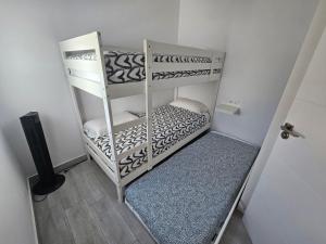 Łóżko lub łóżka w pokoju w obiekcie Apartamento mi currilla