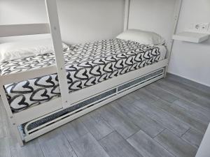 Łóżko lub łóżka w pokoju w obiekcie Apartamento mi currilla