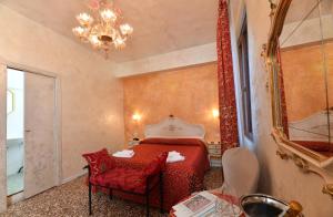 Łóżko lub łóżka w pokoju w obiekcie Locanda Casa Martini