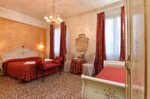 Łóżko lub łóżka w pokoju w obiekcie Locanda Casa Martini