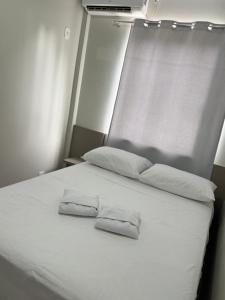 Postel nebo postele na pokoji v ubytování Hotel Andorinha