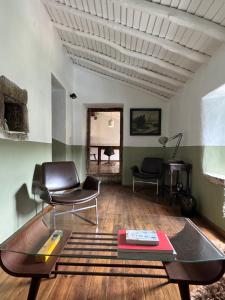 Posezení v ubytování Casa Com Mãos