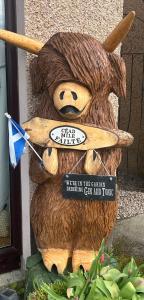 Ein Zertifikat, Auszeichnung, Logo oder anderes Dokument, das in der Unterkunft The Guest suite at Daviot ,Inverness ausgestellt ist